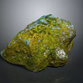 Natural Stone In Natural Form With Green Moss And Blue Spots On Rough Surface