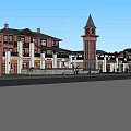 Red Brick Commercial Complex With Clock Tower And Multiple Storefront Buildings