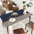 Dining Table Set With Blue Houndstooth Tablecloth Golden Plates Wine Glass And Brown Chairs