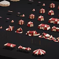 Multiple red and white tents arranged on black background with white structures nearby