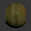 Green Round Military Weapon Featuring Orange Marks Red Central Symbol And Metal Parts