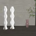 Modern White Wavy Design Floor Lamps With Decorative Bear Figurine And Green Plant