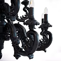Black Classic Chandelier With Intricate Carvings And Multiple Candle Shaped Bulbs
