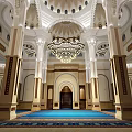 Islamic Mosque Interior With Dome Chandelier And Blue Prayer Carpet For Religious Faith