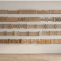 Different Styles of Wooden Fences Showcased on White Wall and Wooden Floor