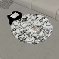 Modern Round Marble Coffee Table With Books And Black Side Table In Living Room