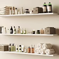 Organized White Shelves With Rolled Towels Bottles Jars And Daily Laundry Essentials