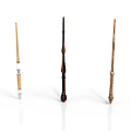 Three Wooden Magic Wands With Carved Designs And Decorative Handles