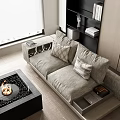 Modern Grey Fabric Loveseat With Decorative Pillows And Bookshelf Near Window