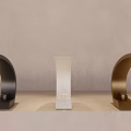 Multiple Modern Faucets In Various Colors And Designs On Light Countertop With Gray Wall