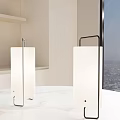 Two Table Lamps With White Shades And Metal Frames On White Marble Tabletop By Window 3d model