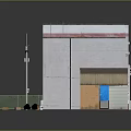 Small Building Structure With Gray Walls Brown Roof Green Street Sign Orange Boxes And Fence