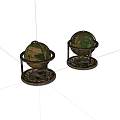Decorative Vintage Globes on Ornate Metal Stands with Intricate Base Patterns