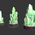 Three Green Crystal Like Decorative Pieces On Black Reflective Bases