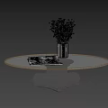 Round Glass Top Coffee Table With Black Carved Base And Decorative Vase