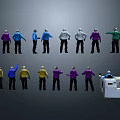 Group Of Men In Different Colored Jackets Posing With White Equipment