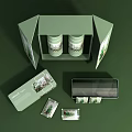 Decorative Ornament Set With Green Gift Boxes Open Packaging And Plant Patterned Tins 3d model