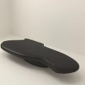 Modern Black Coffee Table With Smooth Surface And Unique Curved Shape