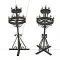 Vintage Metal Candelabra With Multi Tiered Design And Decorative Iron Base