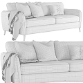 Gray Sofa With Throw Pillows And Blanket In Modern Minimalist Design