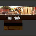 Two Origami Cranes Perched on Wooden Shelf by Window with Outdoor Plants Background