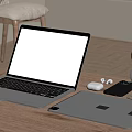Laptop and Tablet Workspace with Headphones and Charging Case