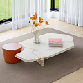 White Marble Coffee Table With Orange Flowers Vase Book And Orange Stool On Rug