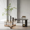 Transparent Glass Coffee Table And Dark Wood Side Table With Deer Figurine And Green Plant