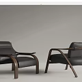 Modern Single Sofa With Black Leather Upholstery And Curved Wooden Armrests