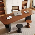 Modern Wooden Desk with Laptop Open Magazine and Papers and Two Stools in Bright Room