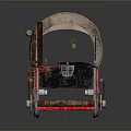 Vintage Covered Wagon With Metal Wheel Parts Displayed On Gray Surface