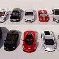 Various Sports Cars Sedans And SUV In Different Colors On Display Stand