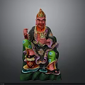 Traditional Deity Statue With Red Face Golden Crown Green Robe And Decorative Base