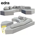 Modern Gray Curved Sofa With Yellow Side Table And Modular Seating Cushions