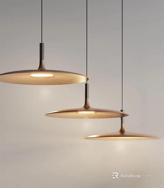Three Disc Shaped Brass Pendant Lights Hanging With Warm Glow In Minimalist Space 3d model 