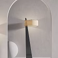 Modern Lamp Combination With Black Base Beige Lampshade Grey Wall Arch Mirror And White Pedestal