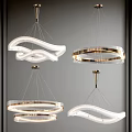 Elegant Modern Chandeliers Featuring Curved Lines And Circular Gold Metal Frames
