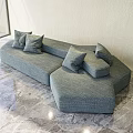 Irregular Shaped Sofa With Light Blue Fabric Plush Cushions On Marble Floor 3d model