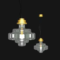 Two Modern Transparent Glass Chandeliers with Golden Accents and Sleek Design