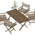 Striped Wooden Folding Table And Director Style Cushioned Chairs Set With Plant Decoration