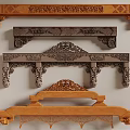 Intricately Carved Wooden And Stone Architectural Components With Ornate Traditional Patterns
