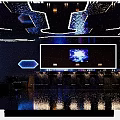 Futuristic Bar Interior With Purple Lighting Stage Neon Lights Background Screen And Person Silhouette