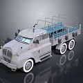 Vintage Gray Truck With Open Cargo Bed Metal Railings And White Wheels