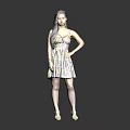 Woman in colorful floral dress against black background with white high heels and hand on hip