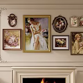 Various Style Oil Paintings With Portrait And Floral Themes On Decorative Wall Above Fireplace