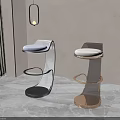 Modern Bar Stools With Black And Gold Metal Frames Upholstered Seats Gray Floor And Plant