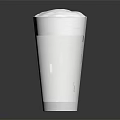 Refreshing Yellow Drink With White Foam In Clear Glass On Dark Background