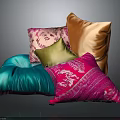 Colorful Decorative Pillows Stacked With Blue Pink Orange Gold Patterns And Solid Designs