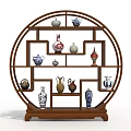 Traditional Circular Wooden Curio Cabinet Displaying Various Vases And Porcelain Art Pieces