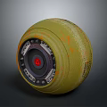 Green Round Military Weapon Featuring Orange Marks Red Central Symbol And Metal Parts